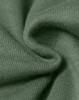 A close-up of textured fabric in a muted green colour, highlighting its soft and snug qualities.
