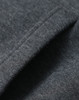 A close-up of a fleecy fabric in dark grey, showcasing the texture of the adult's contrast front hoodie.