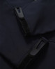 A dark navy softshell hoodie featuring zippered pockets and Velcro closures. It has a sleek and modern design.