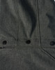 A softshell full zip hoodie in dark grey, featuring snap buttons and a simple design, includes a logo.