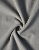 A textured, soft grey fabric featuring a smooth, fleece-like surface. Perfect for jackets and outerwear.