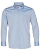 A light blue long sleeve chambray shirt with a button-up front and a pocket on the chest. It features a logo tag.