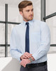 A light blue long sleeve shirt with fine stripes, featuring a chest pocket and paired with a navy tie.