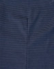 A close-up of a navy blue fabric with a pin dot pattern, showcasing the texture of the shirt.