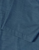 A close-up of a men's short-sleeve button-up shirt in a dark teal colour with a pin dot pattern.