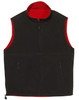 A unisex reversible vest featuring a dark exterior and a contrasting red interior. It includes two zippered pockets and a logo.