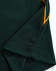 A dark green polo shirt featuring contrasting orange stitching and a branded logo.