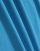 A close-up of smooth, vibrant blue fabric, showcasing the texture and quality of the material.