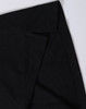 A black polo shirt featuring a classic collar and a logo, highlighting the fabric texture and stitching details.