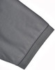 A grey polo shirt featuring a short sleeve with a neatly finished cuff and a logo.