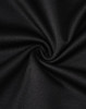 A close-up of black fabric with a smooth texture, showcasing the sustainable poly/cotton blend.
