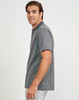 A grey men's polo shirt featuring contrast teal side panels and a logo on the chest.