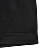 A close-up of a black sustainable poly/cotton polo shirt showing the hem and stitching details. Features a logo.