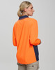 A long-sleeve polo shirt in high visibility orange with navy accents and a logo on the front.