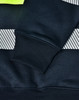 A close-up of a navy work jumper featuring reflective stripes and a high-visibility yellow neckline, with ribbed cuffs.