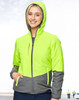 A woman wearing a Hi-Vis quilted two-tone safety jacket in fluorescent yellow and grey, featuring a hood and zipped pockets.
