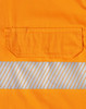 An orange safety shirt featuring segmented reflective tape and a chest pocket. It has a logo on the fabric.