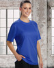 A woman wearing a blue short sleeve tee with a relaxed fit, featuring a logo on the front.