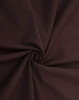 A close-up view of rich brown cotton fabric, showcasing its smooth texture and soft drape.