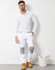 Unisex utility stretch cargo work pants in white with grey accents, featuring pockets. Model wearing a long-sleeve white shirt.