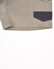 Unisex cotton stretch drill work shorts in khaki with a navy accent pocket. Features a logo on the side.
