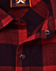 A unisex flannel plaid shirt in red and navy, featuring button details and a collar. It includes a logo tag.