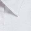 A close-up of a white button-up shirt collar featuring a logo.