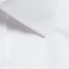 A close-up of a white shirt collar featuring a sleek design and subtle stitching details.