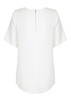 A white short sleeve shirt with a zip at the back and a curved hemline. It has a logo on the label.