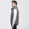 A grey puffer vest displayed on a male model, featuring a high collar and a logo tag.