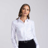 A women's button-up shirt in white with a collar and long sleeves. It features a sleek design and has a logo.