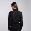 A black button-up shirt with a tailored back design and long sleeves, featuring a logo.