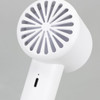 A white personal cooling fan featuring a circular grill design, with a charging port at the base.