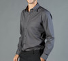 A button-up shirt in a dark grey hue with long sleeves and a chest pocket. It features a logo.