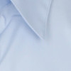 A light blue button-up shirt collar with neat stitching and a smooth texture. Features a logo on the fabric.