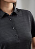 A black short sleeve polo shirt with a collared neck and button placket, featuring a subtle texture.