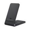 A sleek black wireless charger with a foldable stand and multiple charging surfaces. It features a logo.
