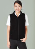 A black micro fleece vest with a zip, worn over a white shirt, featuring side pockets and a neckline zip.