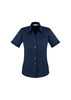 A navy blue women's short sleeve button-up shirt featuring a fitted design and a collar. It has a logo on the chest area.