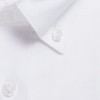 A close-up of a white button-up shirt featuring clear buttons and a classic collar.
