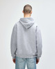 A grey Gildan Heavy Blend adult hooded sweatshirt with a large hood, viewed from the back.