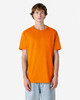 An orange heavyweight cotton unisex T-shirt is displayed, featuring a simple design and a logo.
