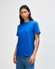 A unisex heavyweight cotton t-shirt in a vibrant blue colour, featuring a simple design and short sleeves.