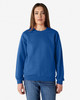 A blue Gildan Heavy Blend adult crewneck sweatshirt on a model, featuring long sleeves and a relaxed fit.