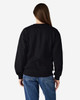 A black Gildan Heavy Blend adult crewneck sweatshirt, viewed from the back, paired with blue jeans.