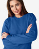 A blue Gildan Heavy Blend adult crewneck sweatshirt on a model with a neutral background, featuring a logo.
