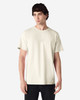 A light cream Gildan Ultra Cotton adult T-shirt on a model, featuring short sleeves and a round neckline.