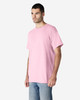 A pink Gildan Ultra Cotton adult T-shirt featuring a crew neck and short sleeves, displayed on a male model.