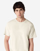 A light beige adult t-shirt with a classic crew neck and short sleeves, featuring a logo.