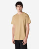 A man wearing a plain khaki Gildan Ultra Cotton adult T-shirt, standing against a white background.